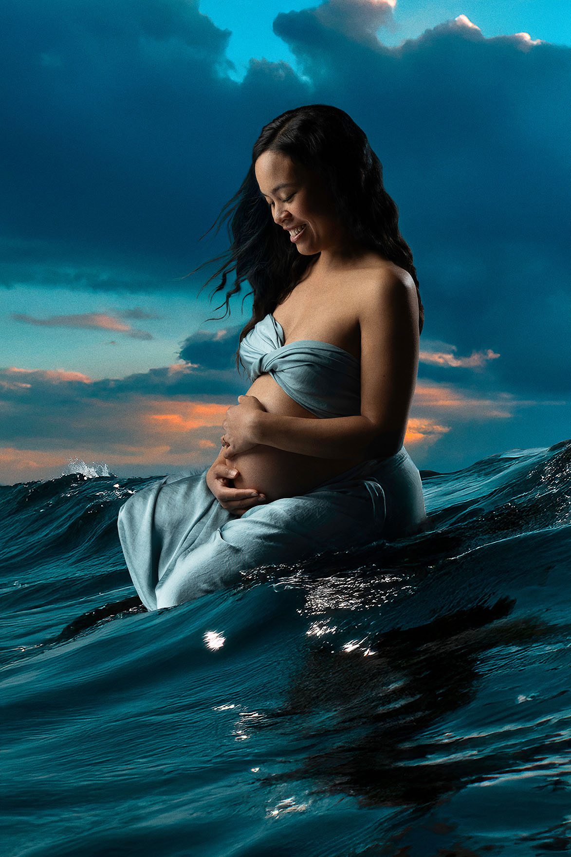 fine art ocean style maternity photo with intimate pose